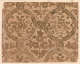 Segment of vintage wallpaper depicting a rustic pattern of brown florals and intricate swirl motifs on a richly tan-toned, textured background.