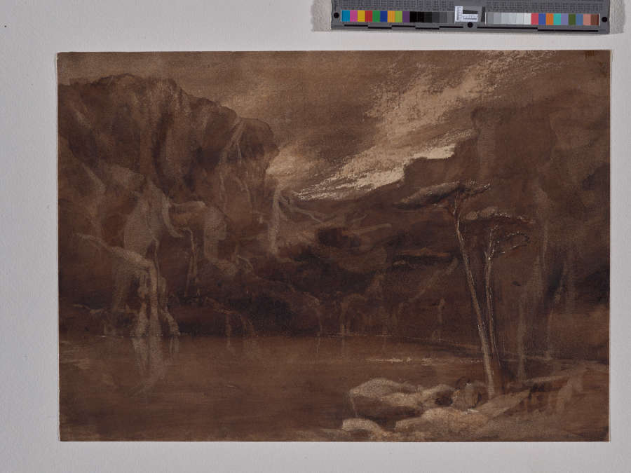 An ink and wash drawing depicting a rocky pond. The two small trees in the lower right are framed by dark mountains and a dramatic sky behind them.