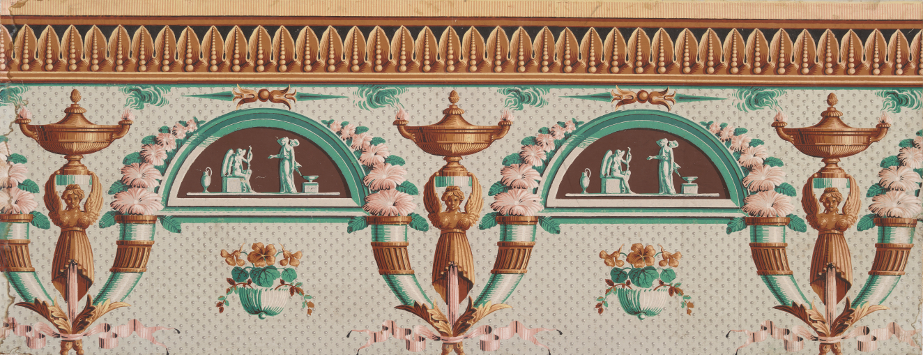 Decorative frieze featuring scenes within semi-circles surrounded by flowers alternating with bronze winged figures holding up urns. The color palette is a subdued mint, pink, bronze, and cream.