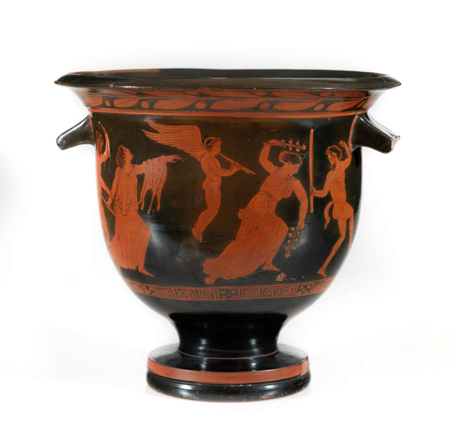 Stout black and terracotta bowl with two handles, decorated with floral motifs wrapped around the cup’s mouth as well as  illustrations of humans, cherubs, and satyrs gesturing towards one another. 