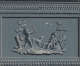 Gray rectangular panel with an elaborate decorative border and raised hunting scene of two figures, one standing holding an arrow aimed at a bird in flight and the other sitting.