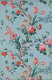 Light blue wallpaper filled with different red, pink and yellow flowers on a singular winding branch. Tiny blue and green flower buds and petals surround the branch.