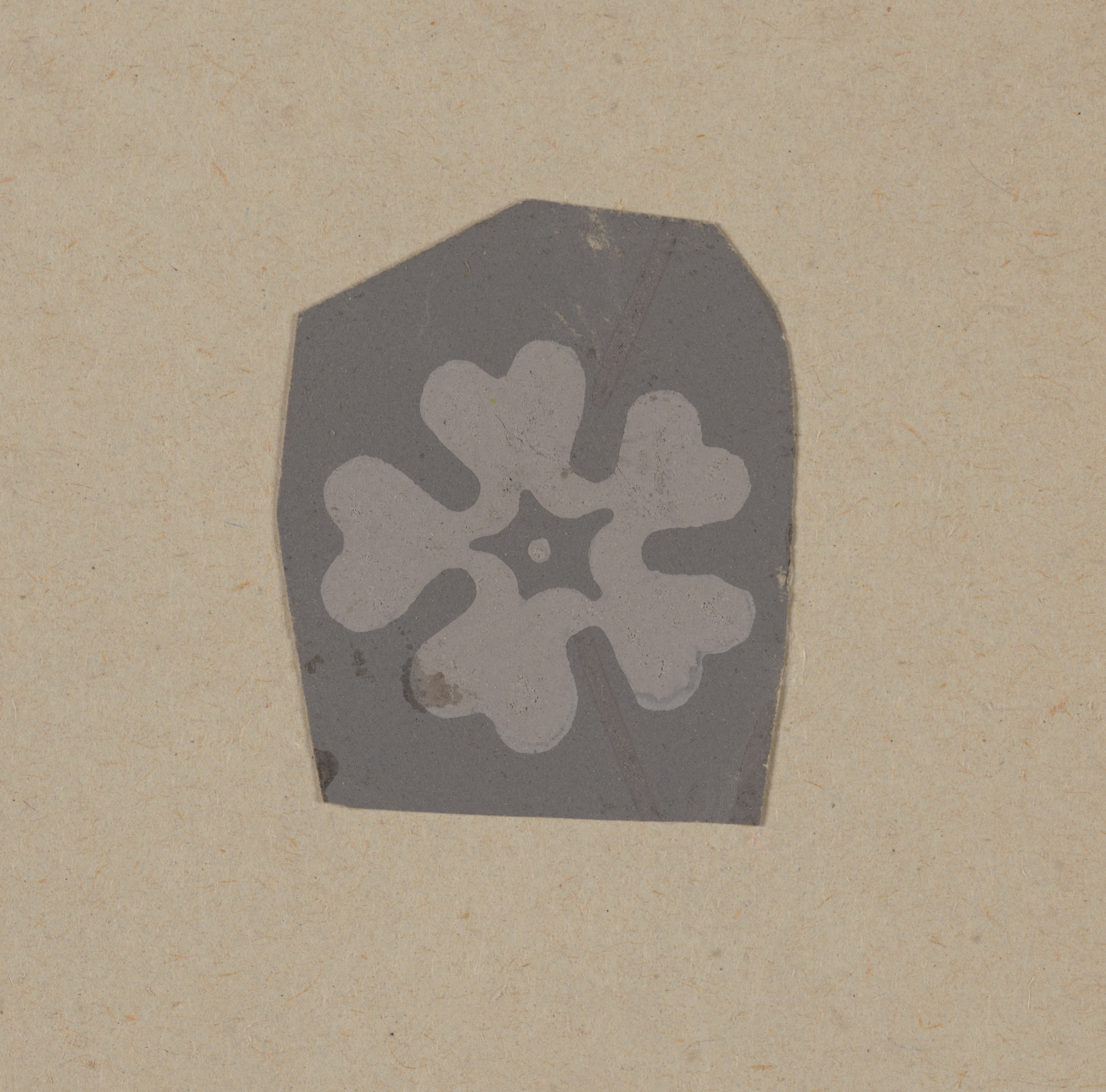 A light gray floral motif with five heart-shaped petals radiating from a small central star on a darker gray background.