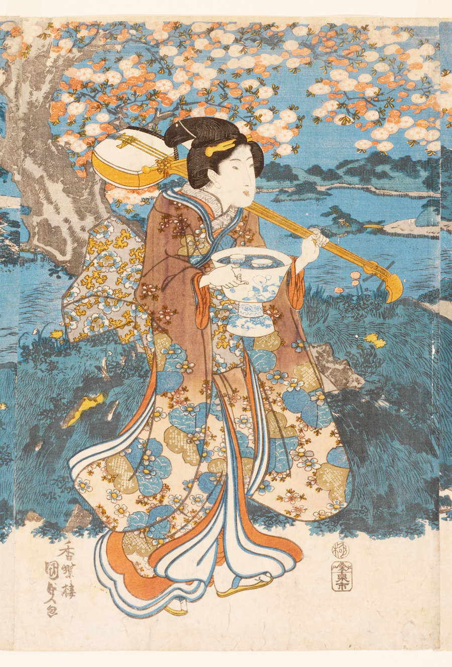 A woodblock print of a woman in a long-sleeved robe. She carries a porcelain wine bowl with cups in one hand and a musical instrument in the other.