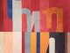 Another detail shot of the center-left area, consisting of red, gray, orange, blue,  and black rectangs with gray and orange letter fragments. 