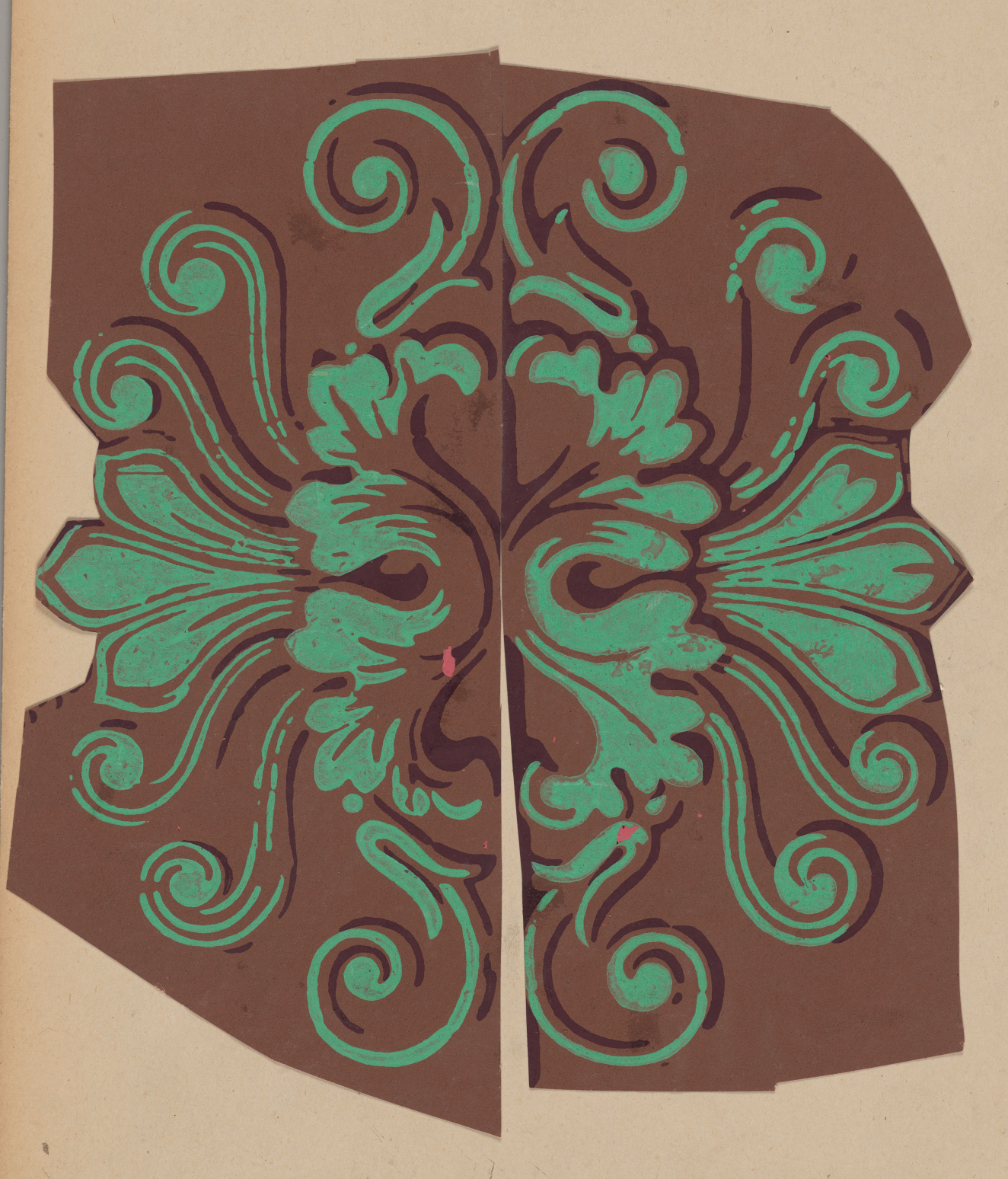 Ornamental designs on a brown backdrop across two cutouts depicting green curving petals extending from  swirling leaves which flow out from the center symmetrically with thin dark brown accents.