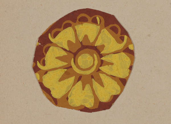 A circular yellow flower motif on a brown base, with radiating petals framed by looping details.