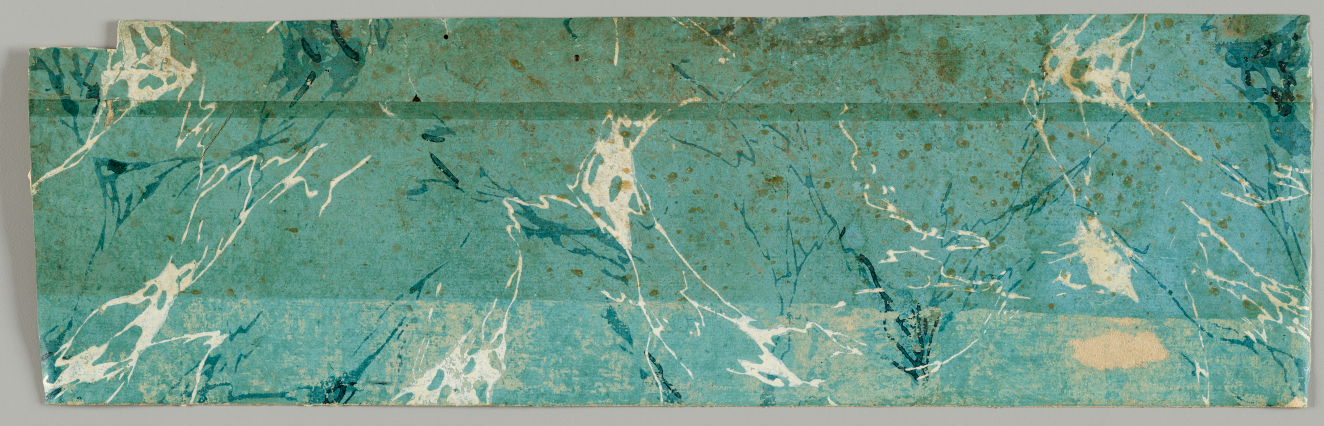 Layered, light blue rectangular wallpaper with tan scuffed marks on top, brown blemished film on bottom, and granite-like texture made out of overlapping, blue and white patchy, thin lines.