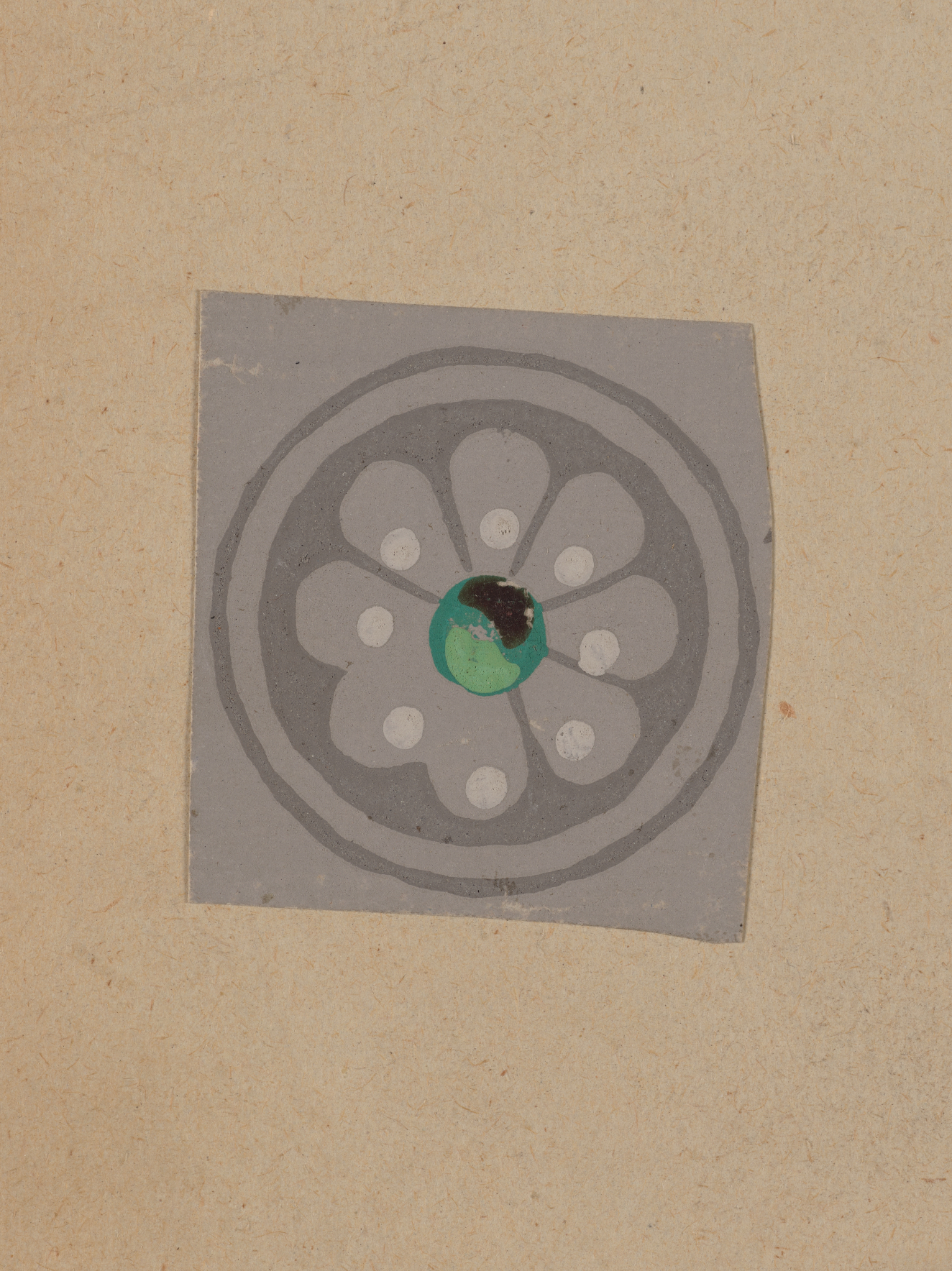 Gray square design on a neutral backdrop. Features a circular design with a flower in the middle which has white accents and a shaded green center.