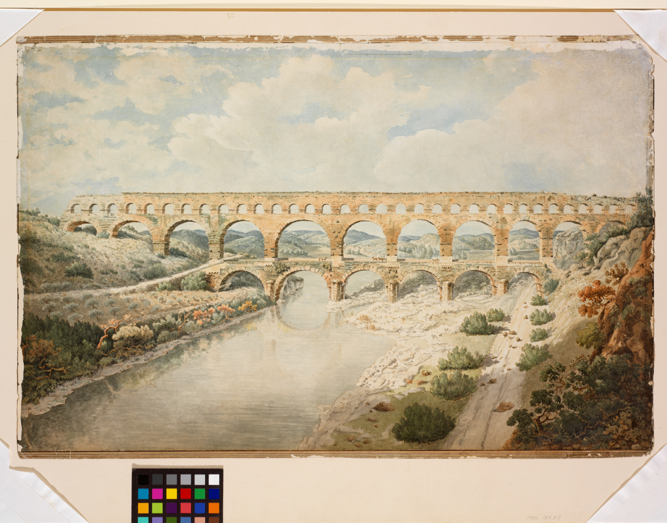 A brown ink and watercolor painting of aqueducts spanning a river in Nimes, France. The river bluff stretches towards the back of the drawing, where it meets the cloud-filled sky.