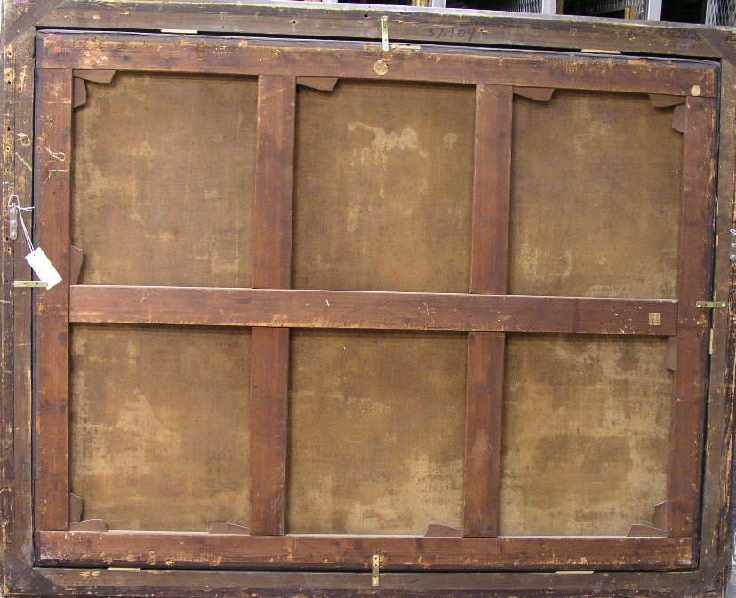 The weathered wooden frame supporting the back of a painting, revealing crossbars for structural support.