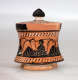 A small, flared, terracotta container with a black-glazed lid, adorned with black figures in flowing robes, holding instruments.