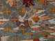 Robe’s back detail. A reclined monk points upwards towards red symbols, amongst earthy pastel clouds, and against a dark background with a thin diagonal grid with floral motifs.