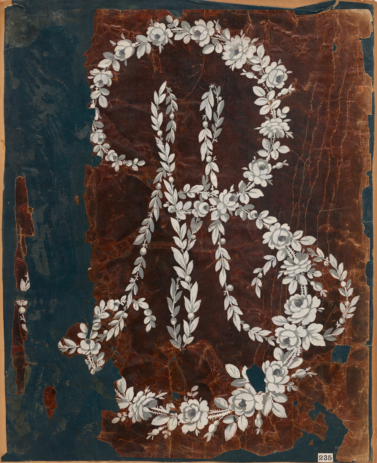 Fragmented and crinkled brown and blue wallpaper with a small rectangular cream tag that reads “235” and interlocking white floral garlands forming a cursive capital “M” within a larger cursive “B.”