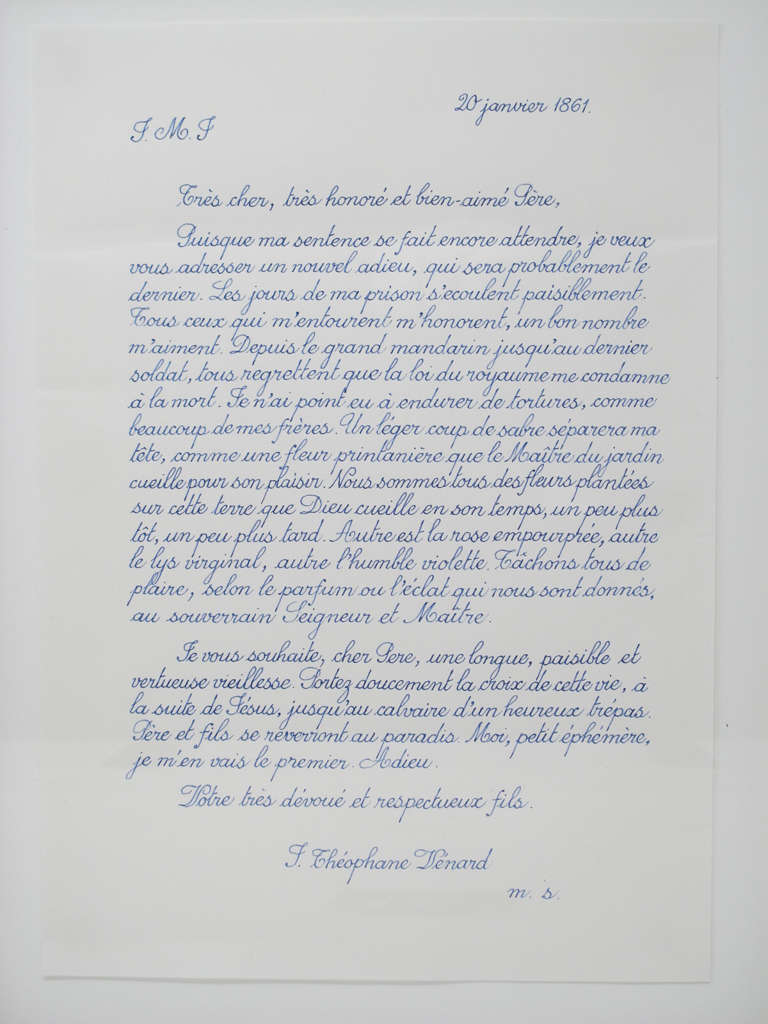A handwritten letter in blue cursive writing on white paper against a white background. The letter is divided into four centered paragraphs with the date in the top right corner. 