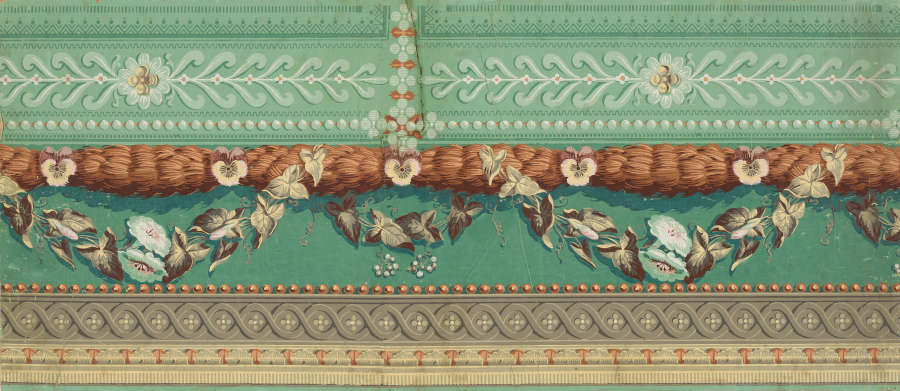 Elegant and botanical border design of floral swags hanging from wheat sheaves against a patterned sage green backdrop. Ornamental patterns line the bottom trim of the design.