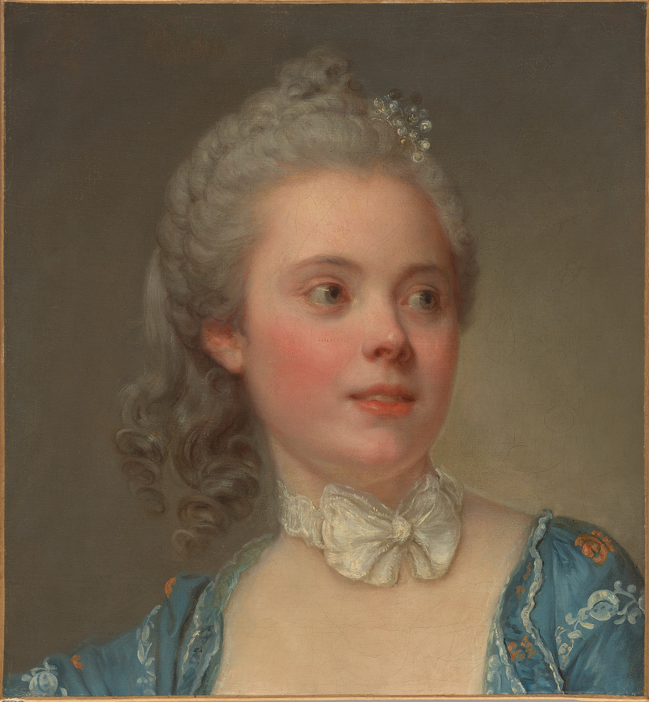 A portrait of a young woman gazing to the right edge, with powdered curls, a pearl hairpiece, a pale blue gown, and a delicate white neck bow.