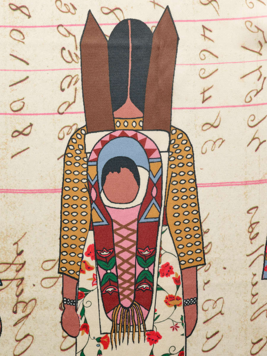 Scarf detail, showing the back of a figure in a yellow dotted top and floral skirt carrying a baby in a patterned container with two horn-like shapes at the top.