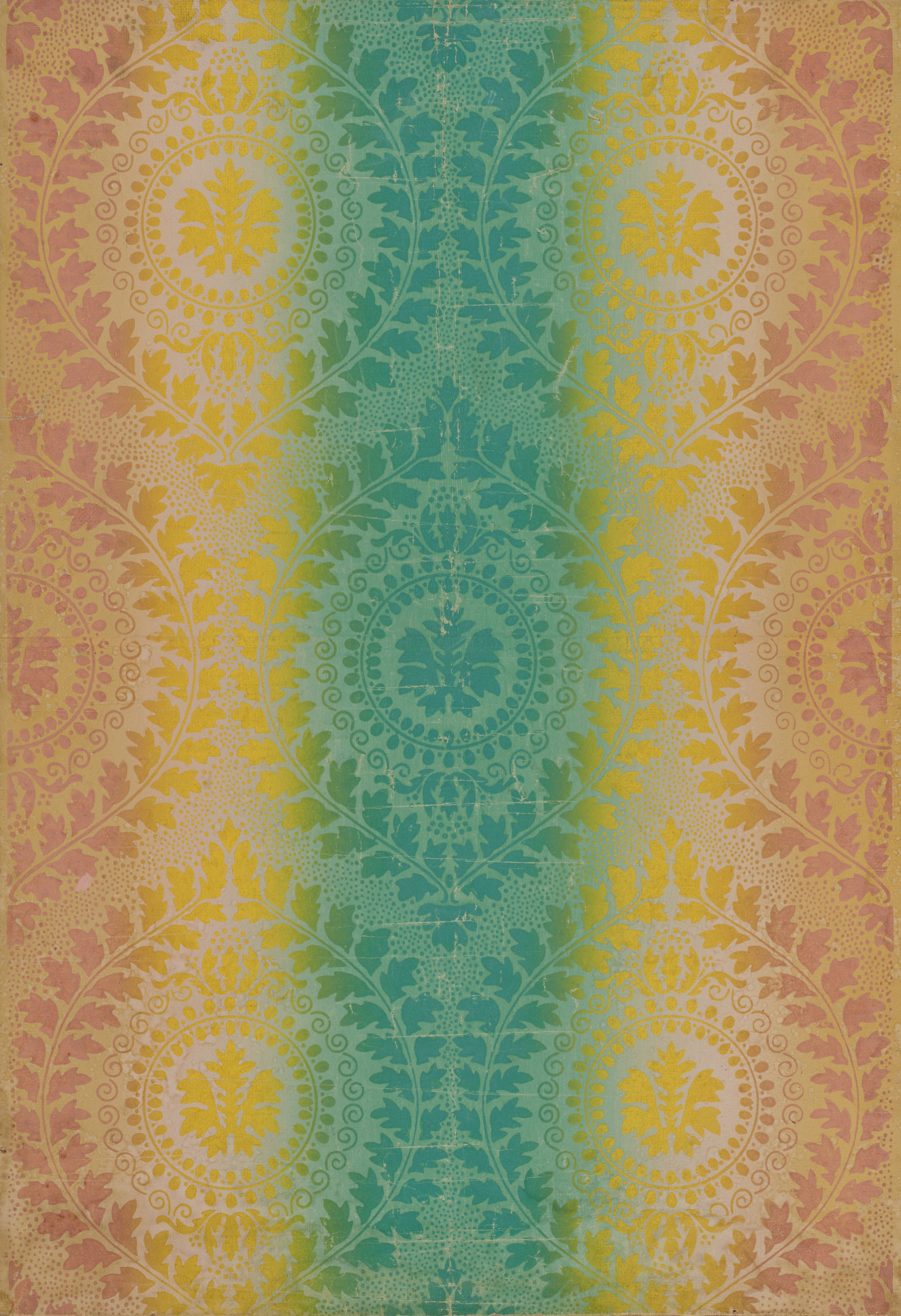 Wallpaper featuring detailed mandalas made of leaf and foliage designs that transition from a muted orange, to sunny yellow, to a cool teal at the center.