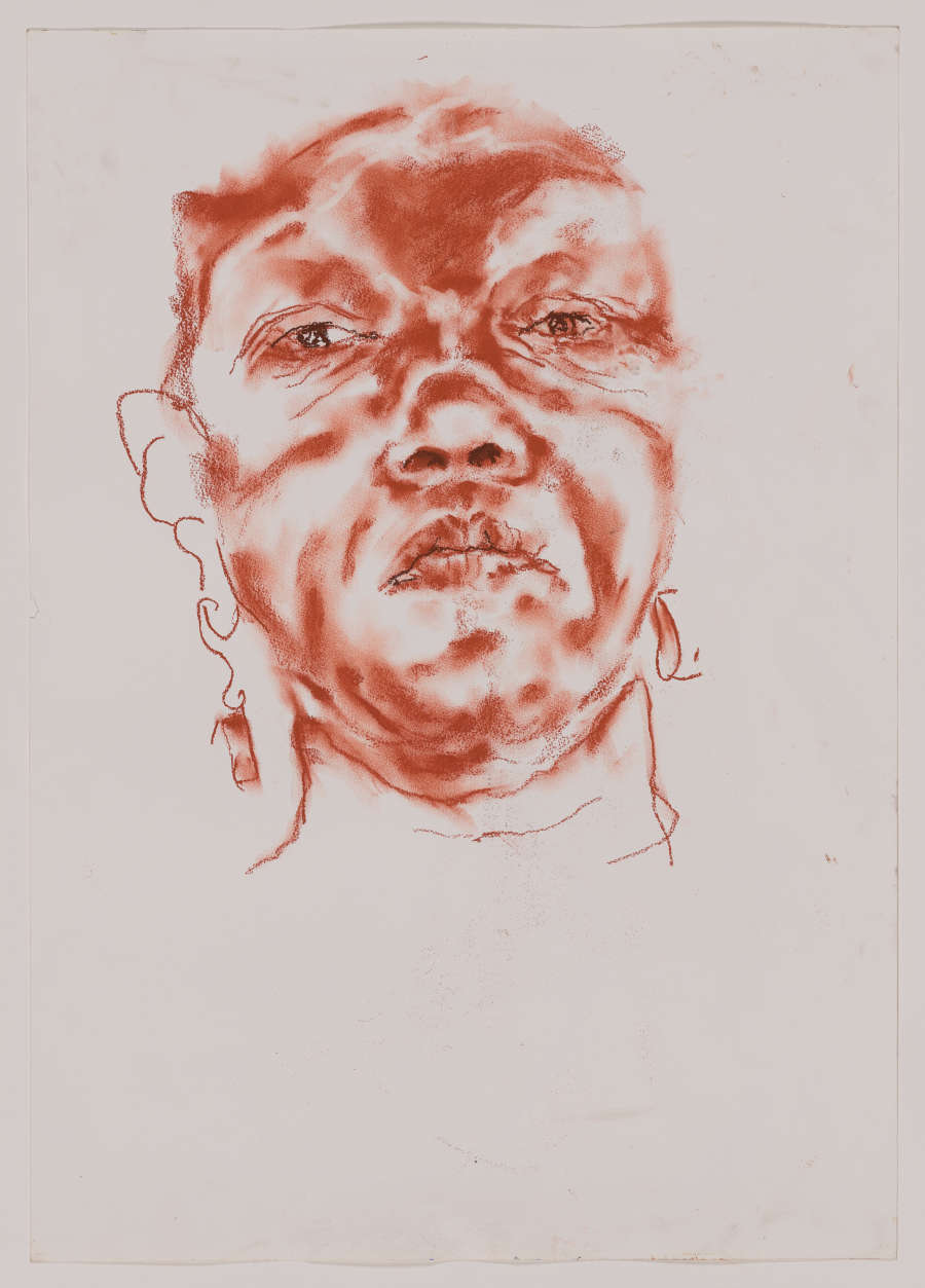 A regal portrait of a woman’s head done in red pastel. Her gaze is commandingand confident. The drawing is rendered using a spare amount of line and marks.
