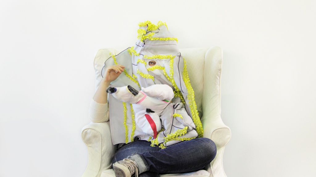 artist in chair in costume