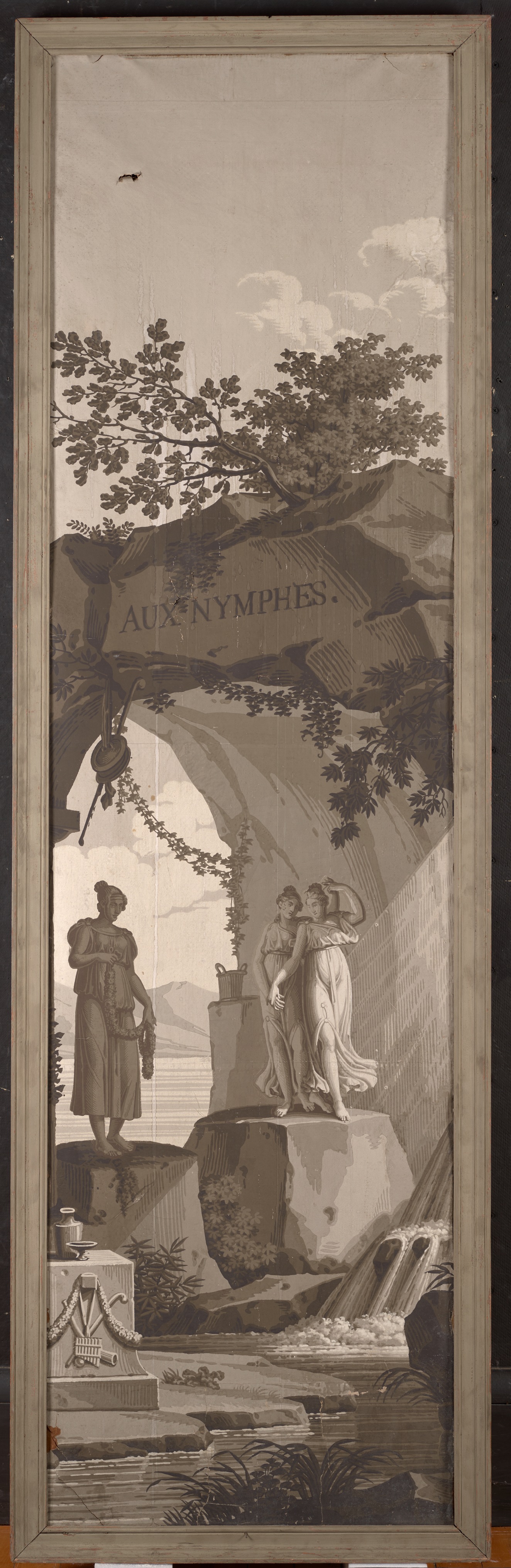 Tall, vertical mural featuring a serene classical scene. Three figures stand in the shade of a stone archway with ‘The Nymphs’ carved into it in Latin.
