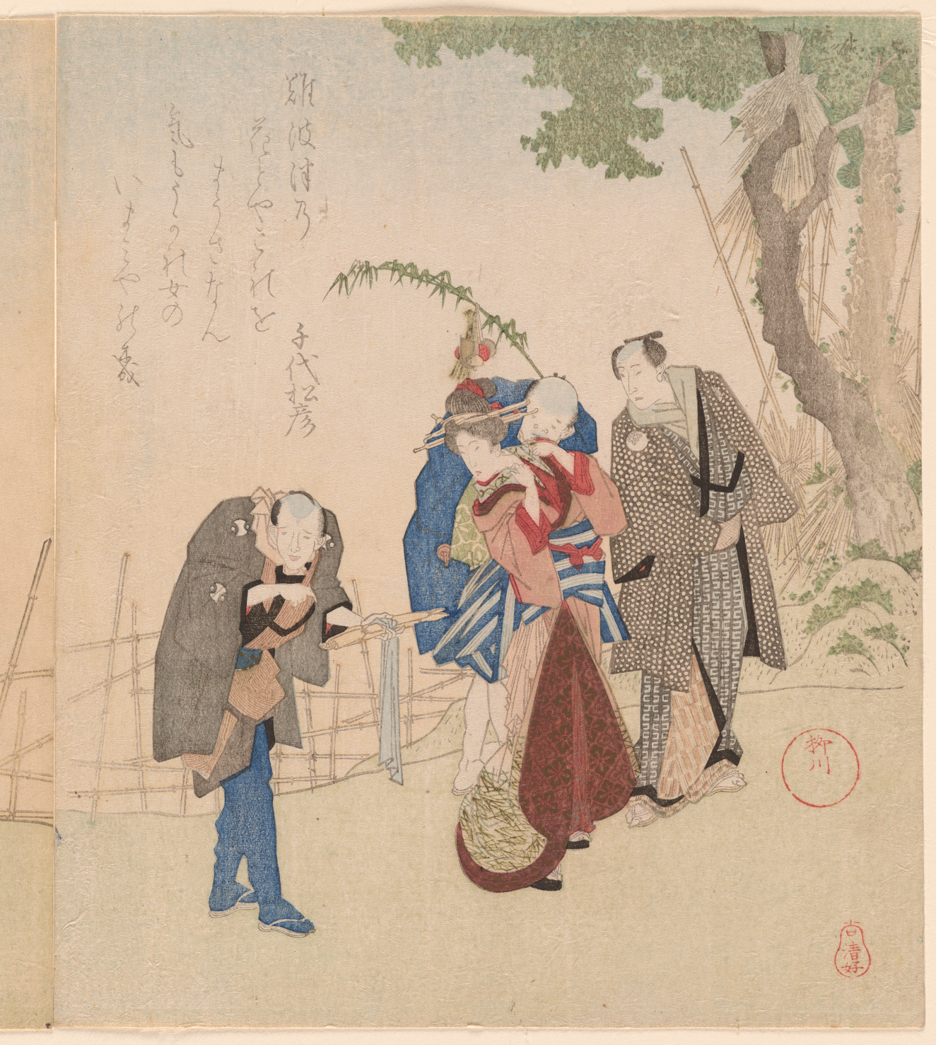 A group of four figures in patterned robes beside a fence and tree, looking back to examine a scroll.