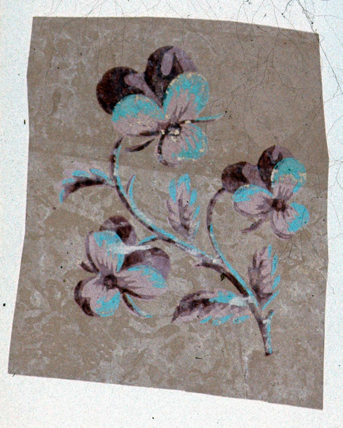 Decorative pattern featuring three flowers on a flowing leafy stem with dark brown shadows and blue highlights on a muted brown, textured background.