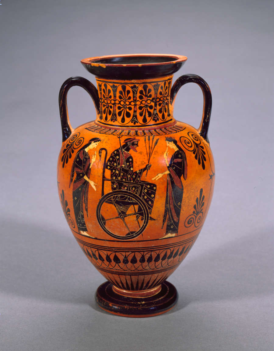 Terracotta onion-shaped jar with two black arched handles and black stripes, decorated with floral and geometric patterns and illustrations of a wheelchaired man amongst two women. 
