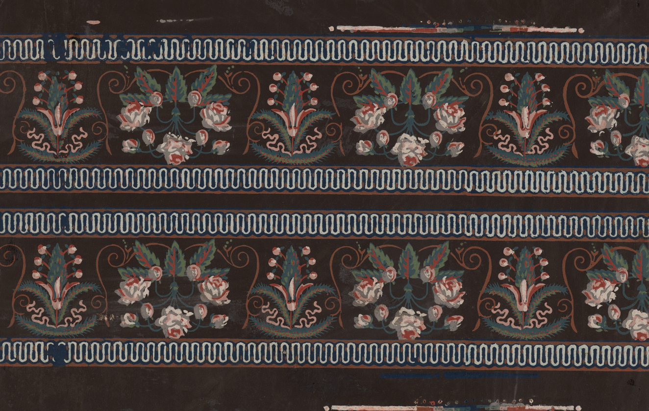 Aged, black moody wallpaper with repeating rows of two floral motifs, made out of various sized white flowers with pink cores, green leaves, and a winding white lined blue border.
