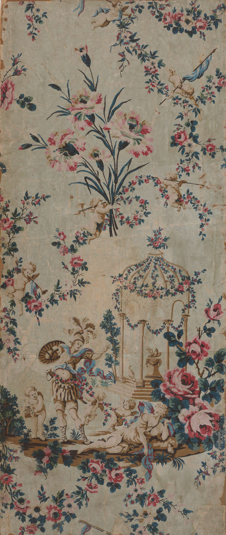 Tall panel of vintage wallpaper featuring a romantic garden scene. The intricate, pastel toned, design depicts playful cherubs, draping garlands of roses, and a gazebo in the background.