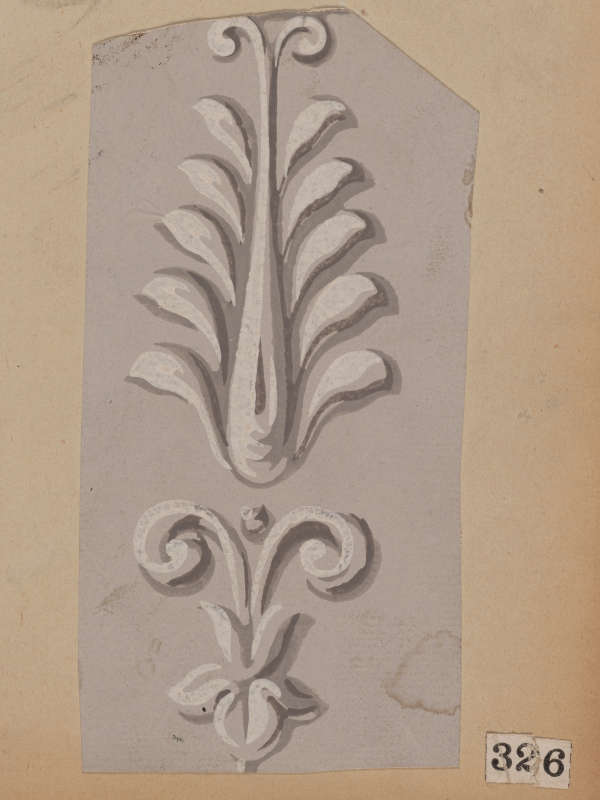 A light gray ornament, featuring a symmetrical leaf pattern above a floral design with curled accents.