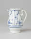 A white chocolate pot with delicate blue decorations with ribbed body, spout, handle, and foot.