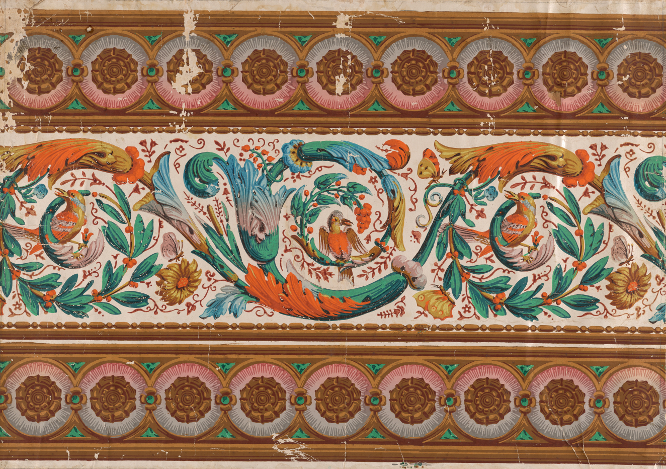 Ornate frieze of swirling acanthus leaves and florals between two rows of decorative borders in a vibrant palette of teal, orange, and brown.