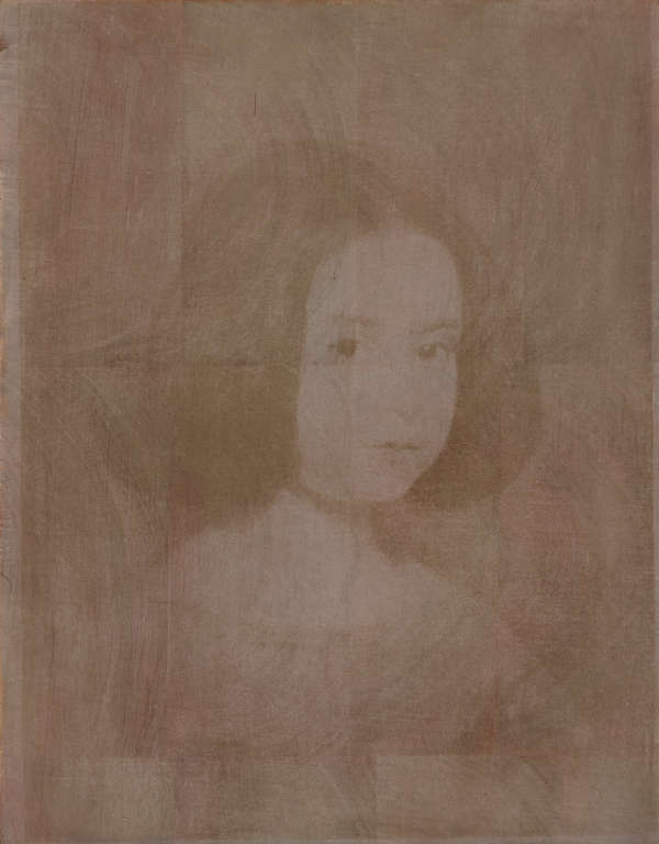 A faded monochrome portrait of a young girl with a dark bob, facing towards the right.