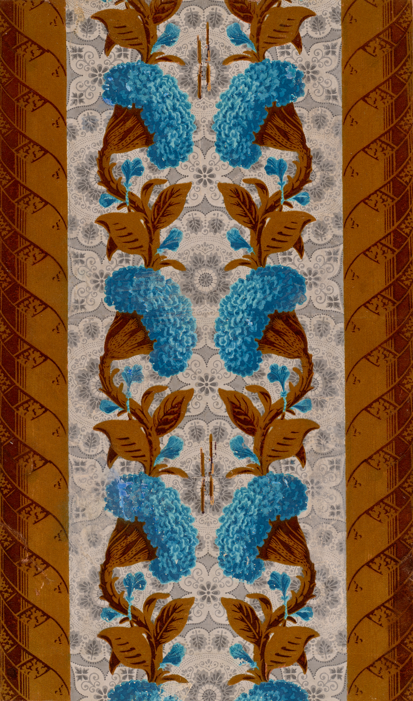 Brown bordered wallpaper containing large blue hydrangeas with thick brown leaves and stems, mirrored and repeated down the center, overtop a white and gray lacelike floral pattern.