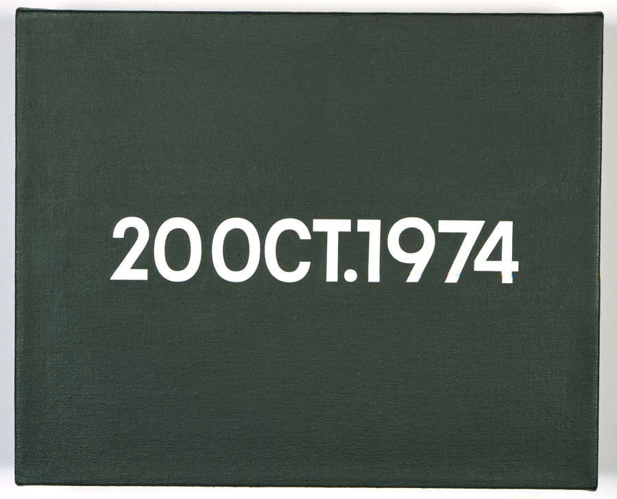  A black panel that reads 20 OCT. 1974 in bold white text.