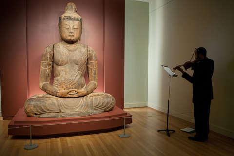 CMW Fellow Shawn LeSure performing by the Dainichi Buddha