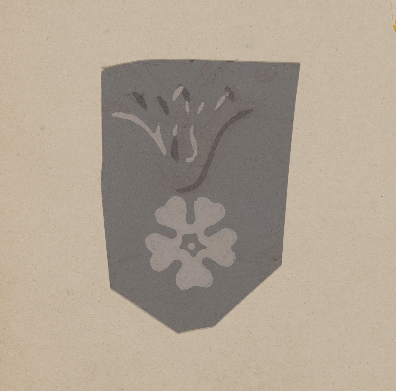 Dark gray decorative motif cutout on a neutral background featuring detailing in a curved floral shape above a light gray five petalled flower.