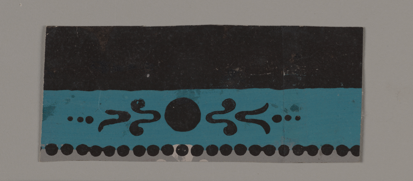 Ornamental border on a neutral background with a black upper section and teal lower section which features a circle between symmetrical curved flourishes, with a dotted line below.