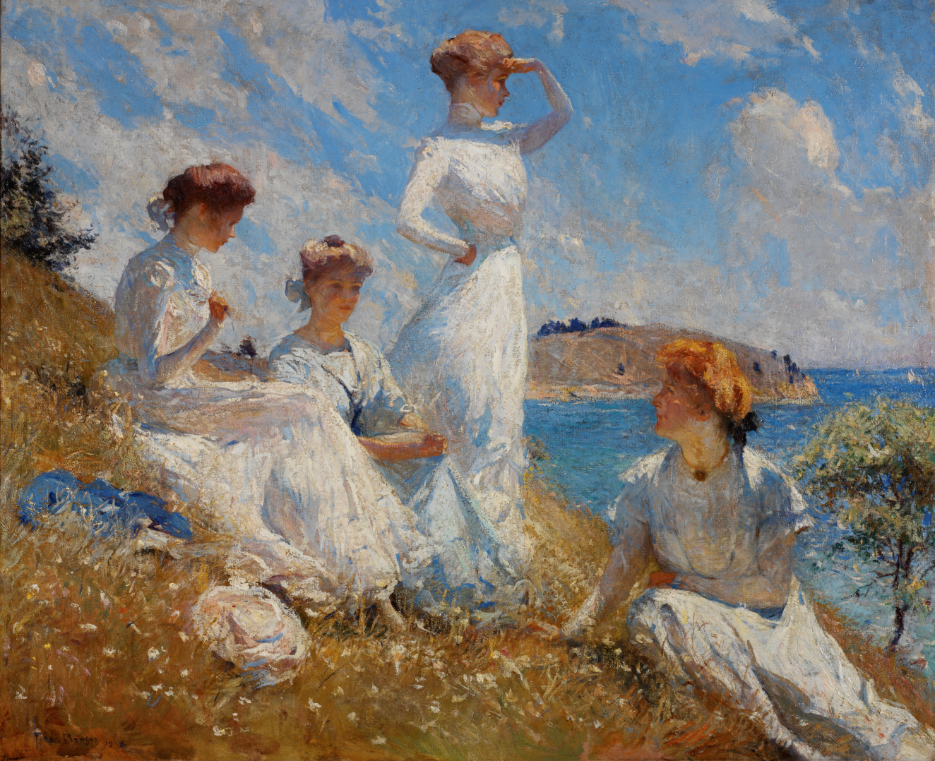 Four women in flowing white dresses relaxing on a sunlight grassy slope, enjoying the breeze and bright blue sky.