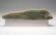 Pale green jade carving with a smooth, elongated form and shallow carved lines.