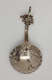  A silver caddy spoon with figurative and sculptural elements.