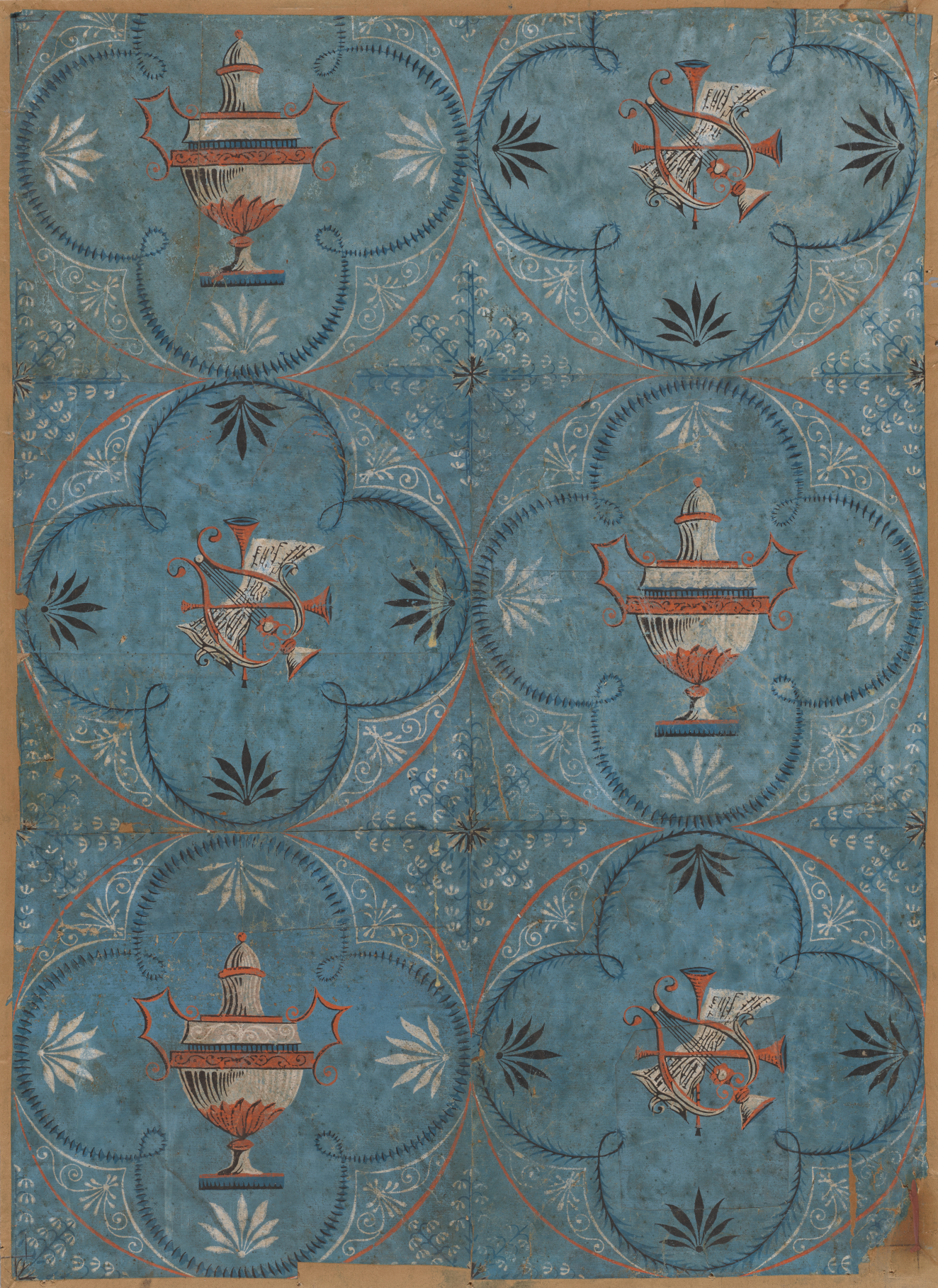 Antique wallpaper made of individual teal tiles featuring urns and musical instruments surrounded by foliage motifs within a rounded four-leaf clover. The instrument tiles and urn tiles are arranged alternatingly.