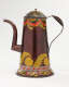 A shiny, brown colored coffee pot with yellow, white, and orange and abstract floral decoration. The spout has a right angle and then a curve.
