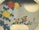 Japanese woodblock print of yellow and orange flowers with blue-green leaves against a background of a large, looming, and pale moon. Calligraphy script is to the left of the composition.