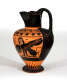 Tall black and orange onion-shaped jar with a pinched mouth forming a spout and a handle. It is decorated with natural and geometric patterns and illustrations of a sphynx.