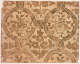 Segment of vintage wallpaper depicting a rustic pattern of brown florals and intricate swirl motifs on a richly tan-toned, textured background.