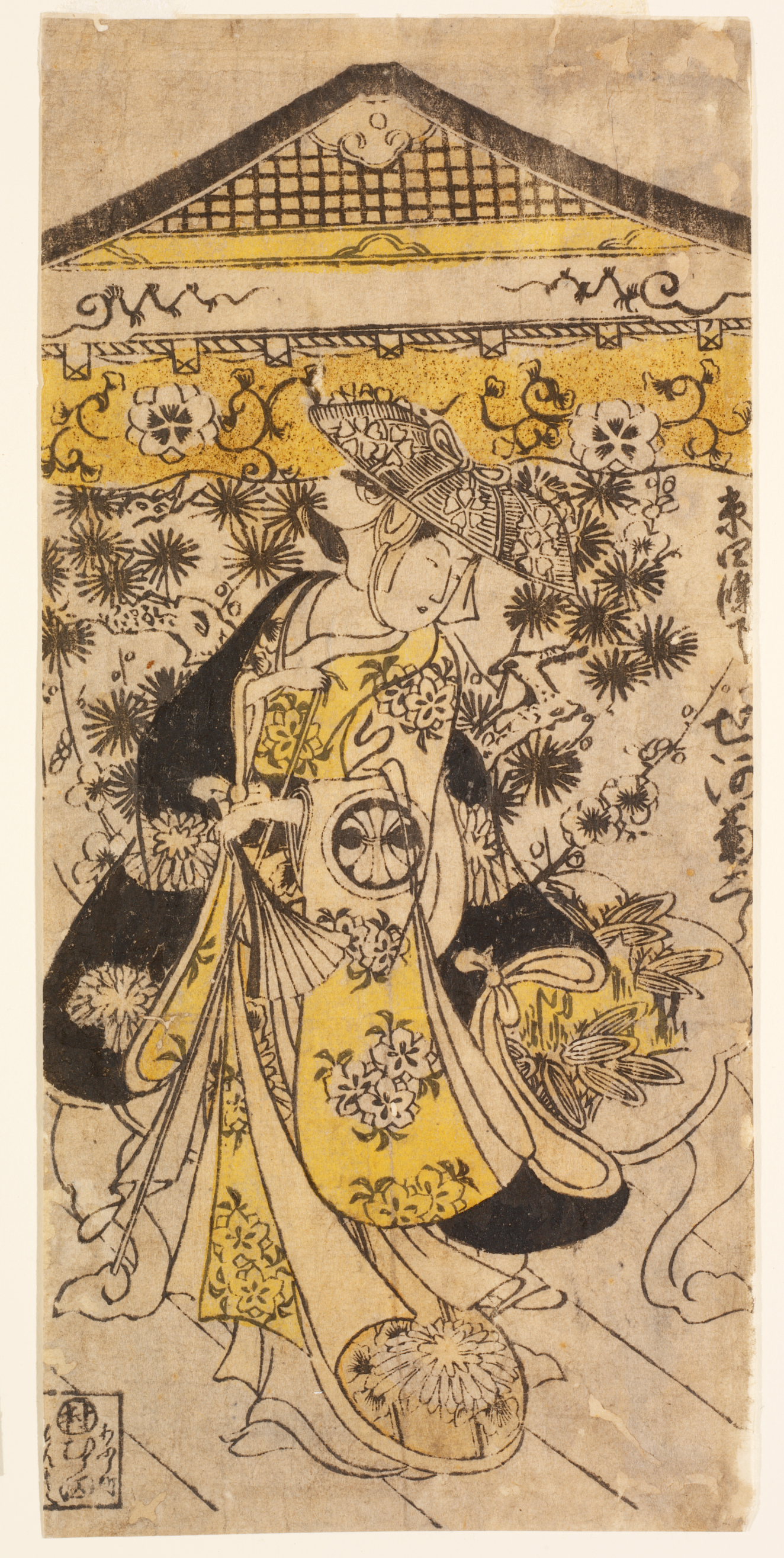 Japanese print of a standing figure wearing a black and yellow floral patterned robe looking down to their left. Behind the figure is a yellow house with floral embellishments. 