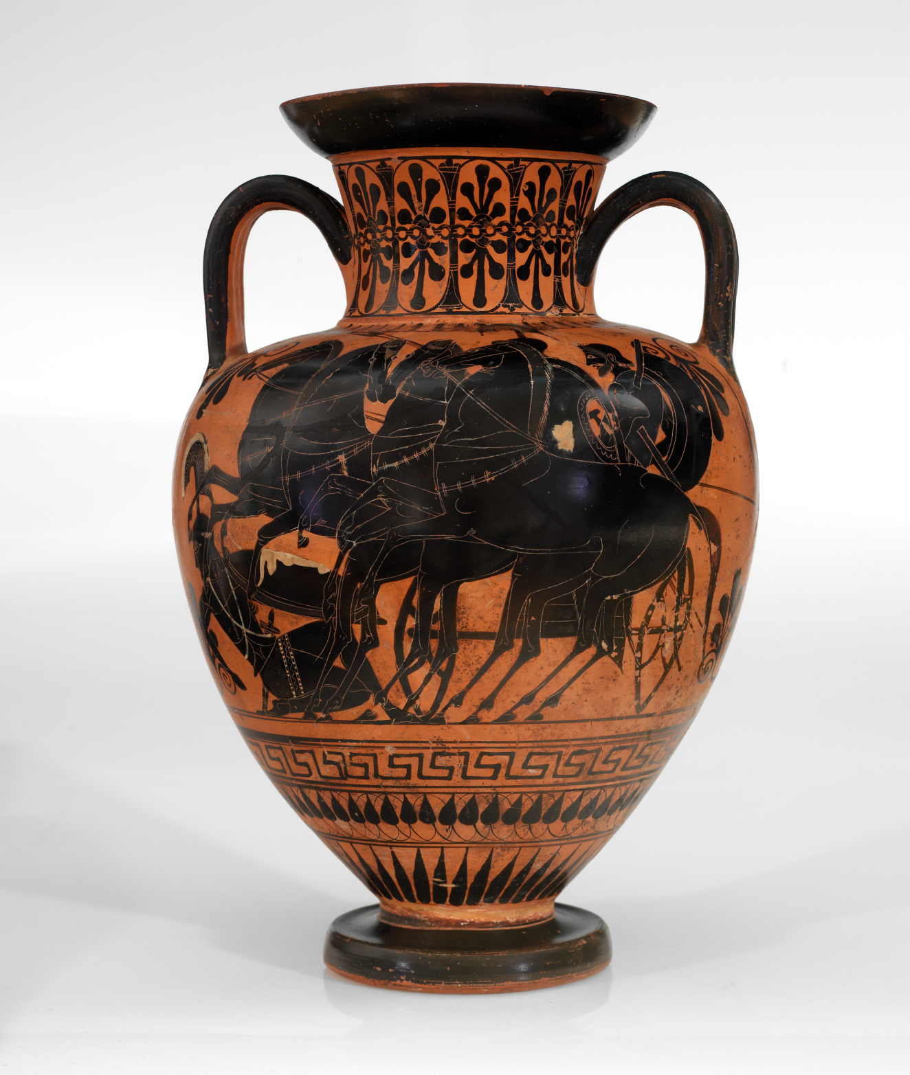 A tall terracotta vase with two dark handles, depicting a chariot scene with multiple horses and figures, bordered by geometric patterns in black.